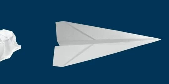 Paper airplane flying directly towards the november 2022 newsletter!