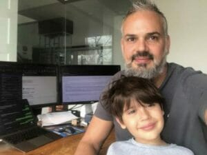 MBU image of Michael Contento and his son during the pandemic