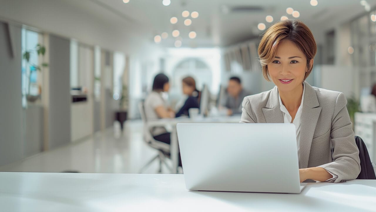 f12.cyber-security-services.woman-on-laptop