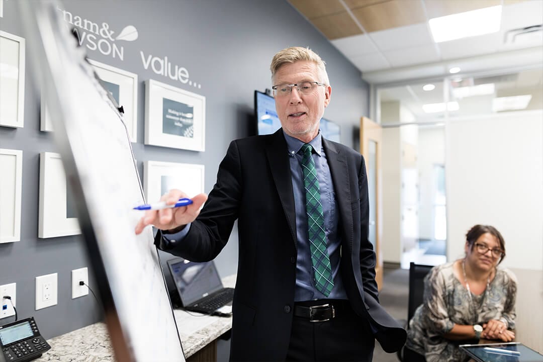 f12.mergers-and-ACQUISITION-Image.man-office