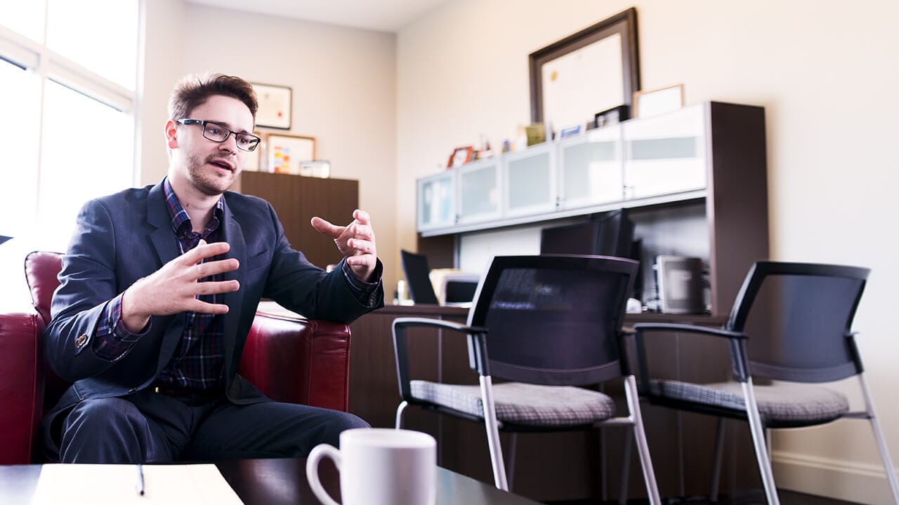 f12.mergers-and-ACQUISITION-man-talking