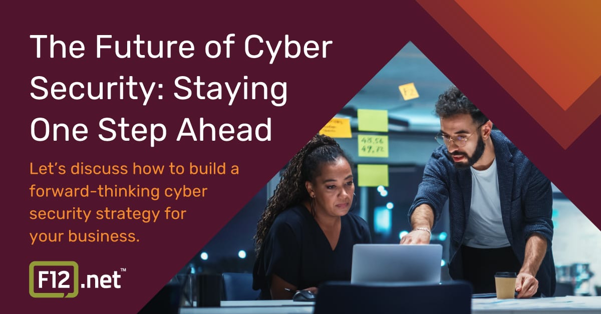 The Future of Cyber Security: Staying One Step Ahead Two professionals discussing a cyber security strategy in a modern office. Explore the future of cyber security and how to stay one step ahead.