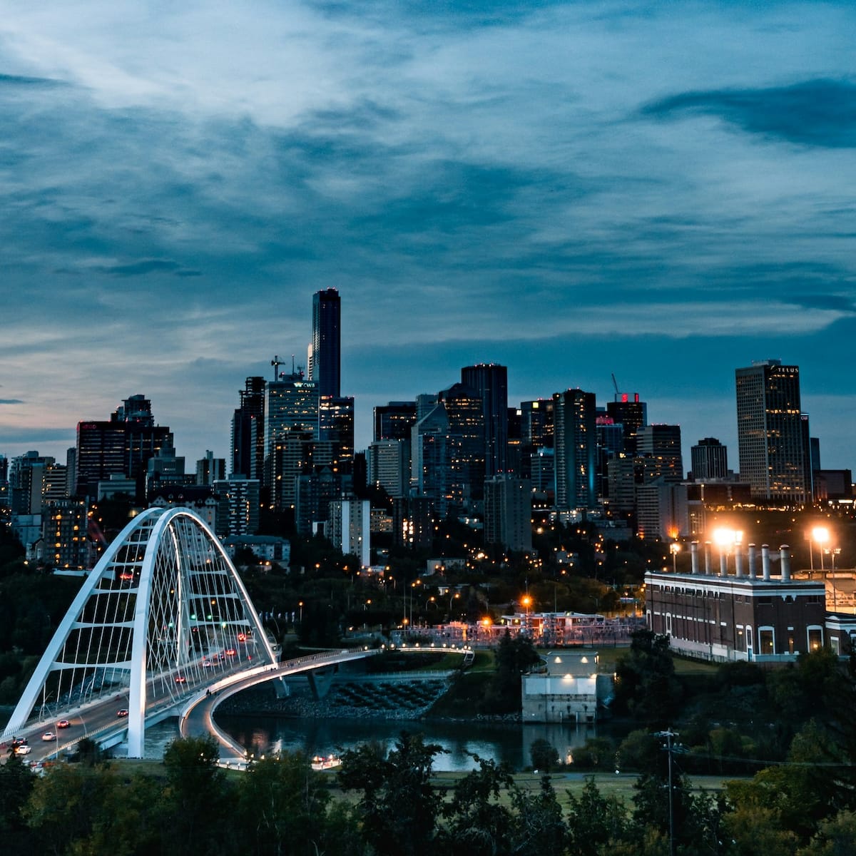 Woman walking down the street with a mobile device in Toronto, Canada