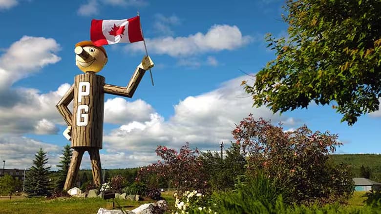 Woman walking down the street with a mobile device in Toronto, Canada