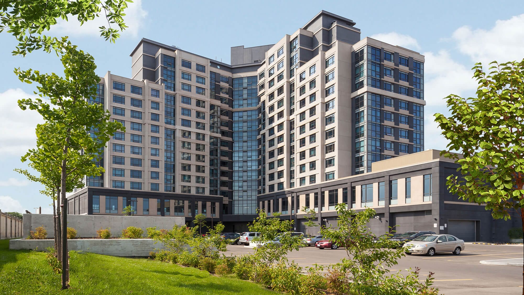 Woman walking down the street with a mobile device in Toronto, Canada